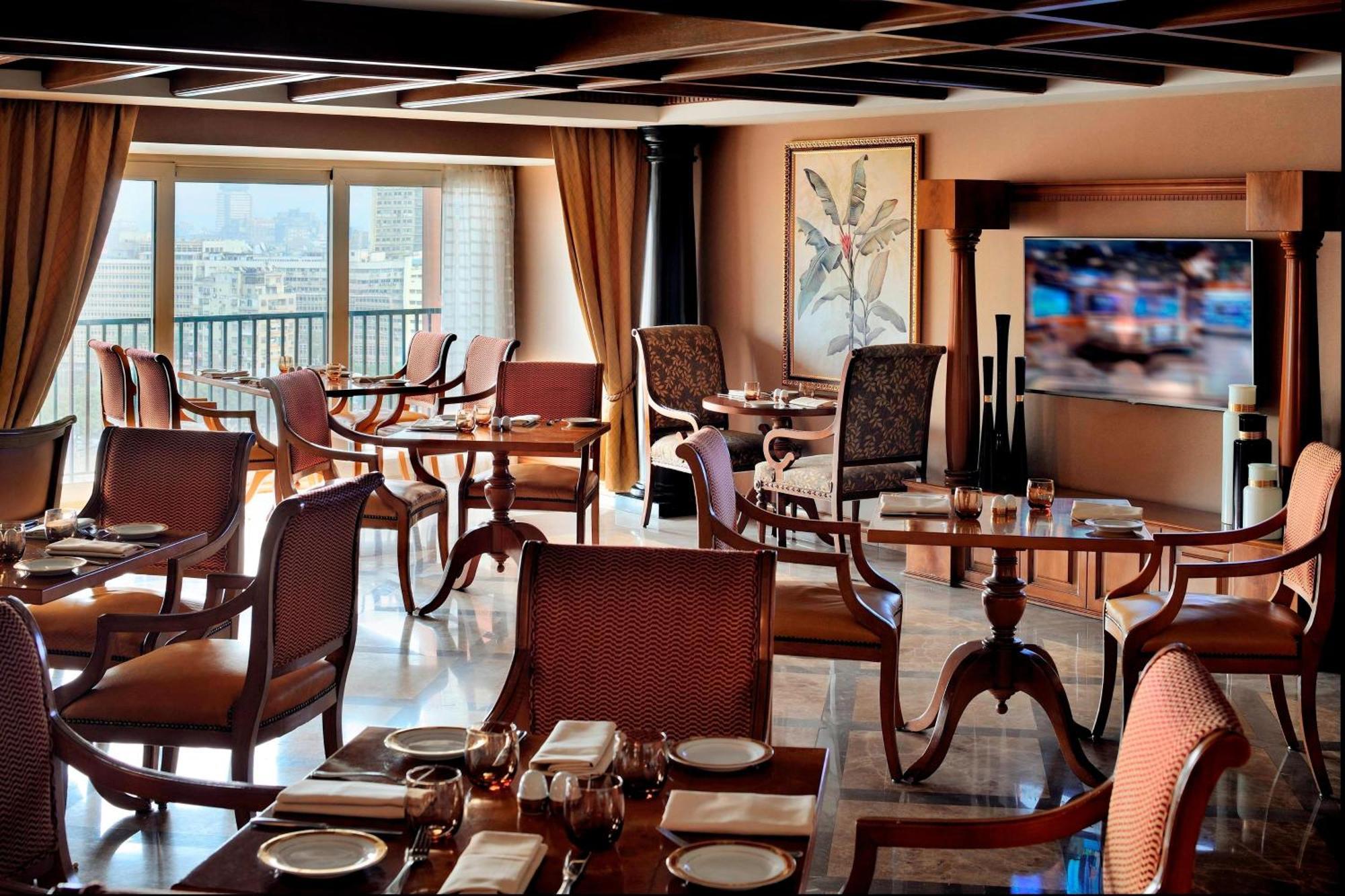 开罗万豪酒店及奥马尔海亚姆赌场 Giza 外观 照片 The Club Lounge at the Taj Mahal Palace